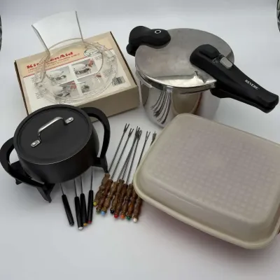Revere Pressure Cooker, West Bend Fondue Set, Tupperware, and KitchenAid Pouring Shield