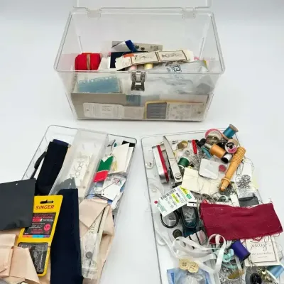 Clear Plastic Sewing Box  with Singer Needles, Threads, Fabric, and Notions