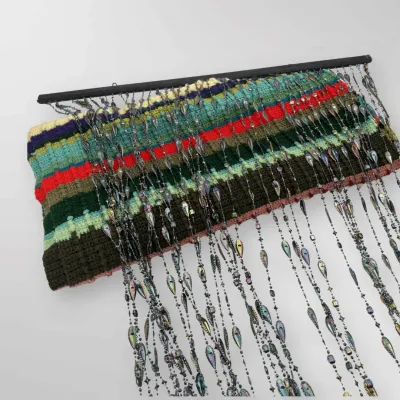 Handmade Striped Crochet Afghan and Iridescent Beaded Curtain