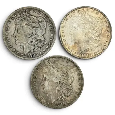 Three Morgan Silver Dollars - 1880, 1881, 1882