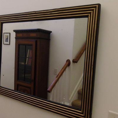 19th Century French Empire Style Ebonized and Giltwood Mirror