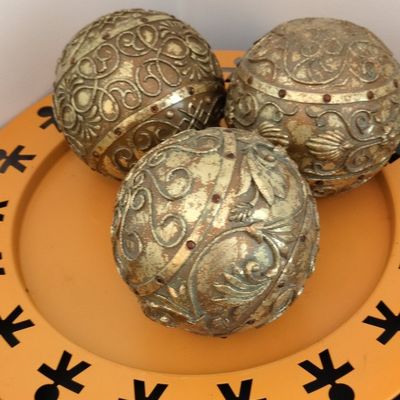 Set of 3 Ornate Gold-Tone Decorative Spheres on Mustard Yellow Tray