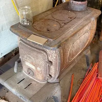 Sale Photo Thumbnail #322: USSC Logwood Model 2421 Cast Iron Wood Burning Stove – White Cloud