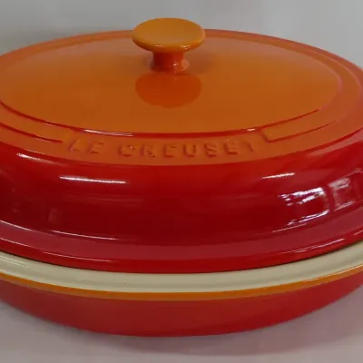 Sale Photo Thumbnail #332: Le Creuset Large Stoneware Covered Oval Casserole - Orange/Red, 13" in Base of Casserole