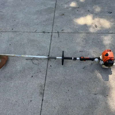 Sale Photo Thumbnail #327: Stihl KM 110R Gas KombiMotor with Trimmer, Edger, and Hedge Trimmer Attachments Lot – White Cloud