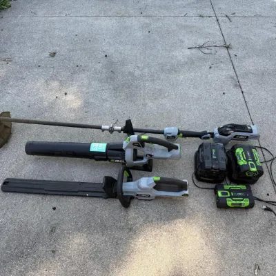Sale Photo Thumbnail #328: EGO Power+ 56V Cordless Lawn Care Combo, Trimmer, Blower, Hedge Trimmer, Batteries, and Chargers – White Cloud