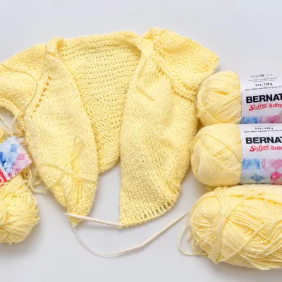 Sale Photo Thumbnail #363: Bernat Softee Baby Yellow Yarn Lot with Unfinished Baby Sweater & Knitting Needles