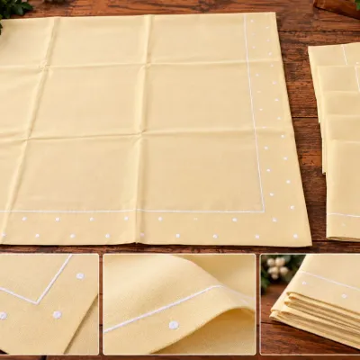 Sale Photo Thumbnail #366: 84 x 60 Buttercream Yellow Tablecloth with 5 Matching Napkins - White Dot Detail