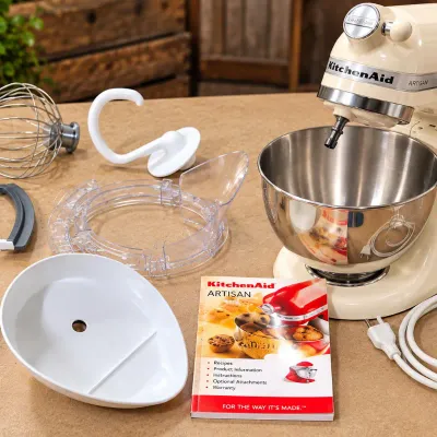 Sale Photo Thumbnail #333: KitchenAid Artisan 5 Qt Ivory 10-Speed Stand Mixer with Bowl, Accessories & Book