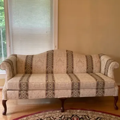 Traditional Camelback Sofa with an Off-white Damask Fabric