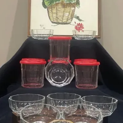 Glass Dessert Bowls & Red-Lidded Storage Containers with Framed Geranium Print