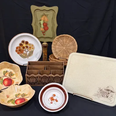 Charming mixed vintage kitchen décor and serving lot with a warm retro harvest theme.