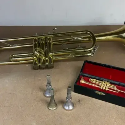 Vincent Bach Trumpet With Miniature Trumpet