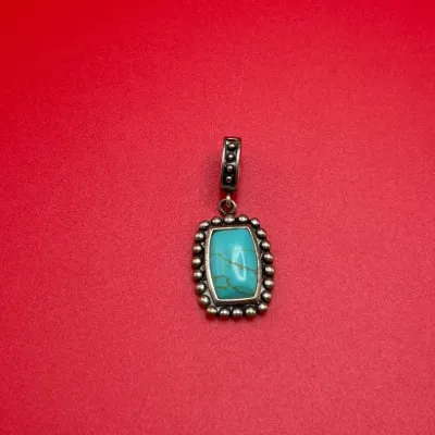 Sterling Silver And Turquoise Pendant