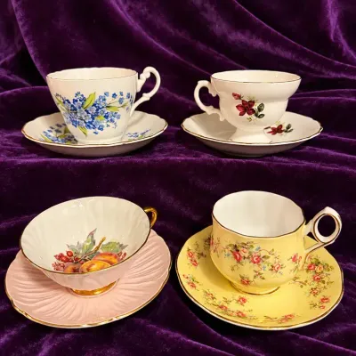 Four Bone China Cups And Saucers