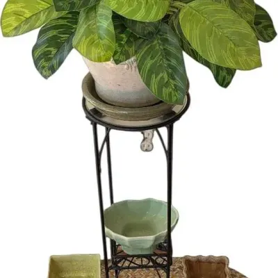 Plant Stand, Planters, And Oval Braided Rug