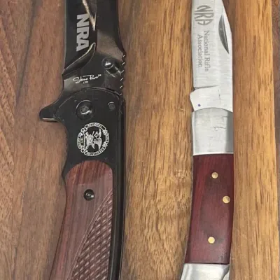 
(2) National Rifle Association Folding Pocket Knives
