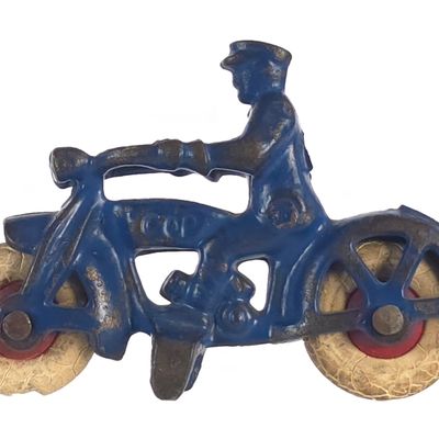 Sale Photo Thumbnail #408: Hubley Small Blue Cop Cast Iron
