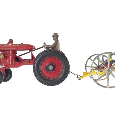 Sale Photo Thumbnail #489: Arcade Toys Culti-Vision Farmall Cast Iron Tractor & Hay Rake