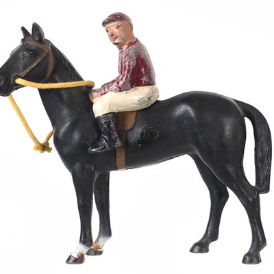Sale Photo Thumbnail #479: Hubley Black Horse/Thoroughbred with Red & White Jockey Cast Iron
