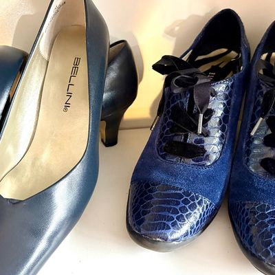 Sale Photo Thumbnail #73: Bellini navy blue leather pumps with a matching belt, alongside a pair of blue suede and faux-snakeskin lace-up shoes.