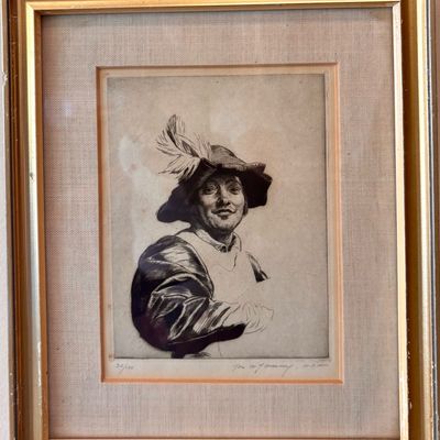 Framed etching depicting a man in a feathered hat, numbered 30/100 and signed by the artist, presented in a gold-finished frame with a...