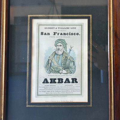 Framed reproduction of a 19th-century clipper ship advertising card for the Glidden & Williams' Line ship "Akbar,"...