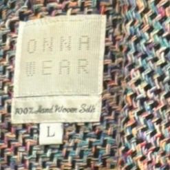 Onna Wear 100% hand-woven silk garment in size large, featuring a colorful textured weave pattern.