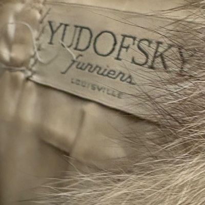 Vintage fur coat featuring a Yudofsky Furriers Louisville label sewn into the satin lining.