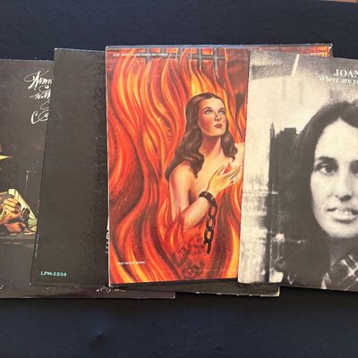 Collection of vintage vinyl record albums, including Joan Baez's "Where are you now, my son?" and Loggins and...