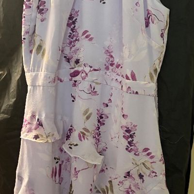 White House Black Market halter-neck maxi dress featuring a lavender and purple floral wisteria print with ruffled skirt detailing.