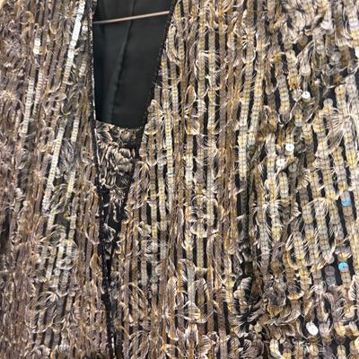 Vintage Nolan Miller sequined evening jacket and matching top, size 8, featuring an intricate gold and silver floral pattern with...