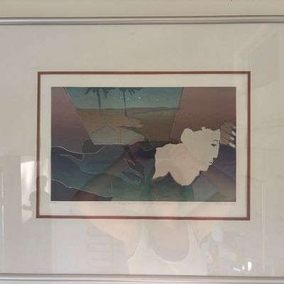 Framed and matted limited edition print featuring a stylized, surrealist portrait of a figure set against a landscape with palm trees,...