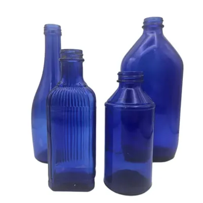 Lot Of 4 Vintage Cobalt Blue Bottles 