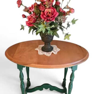 Oval Wooden Table w/ Floral Arrangement