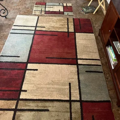 A Pair Of Rugs