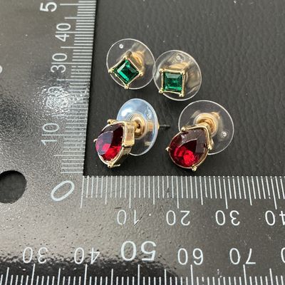 Two Pairs of Gold-Tone Stud Earrings with Red and Green Stones