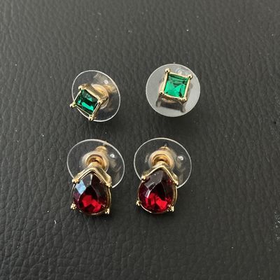 Two Pairs of Gold-Tone Stud Earrings with Red and Green Stones