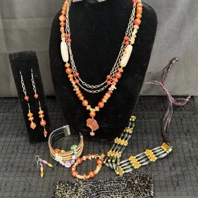 Carved Carnelian Necklace, Bracelet, Earrings & Company 