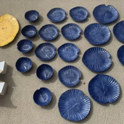 Assortment of Blue Plates and Figurines 