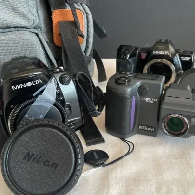 Minolta Maxxum Cameras And Nikon Cool Pix With Vintage Sony Video Camera