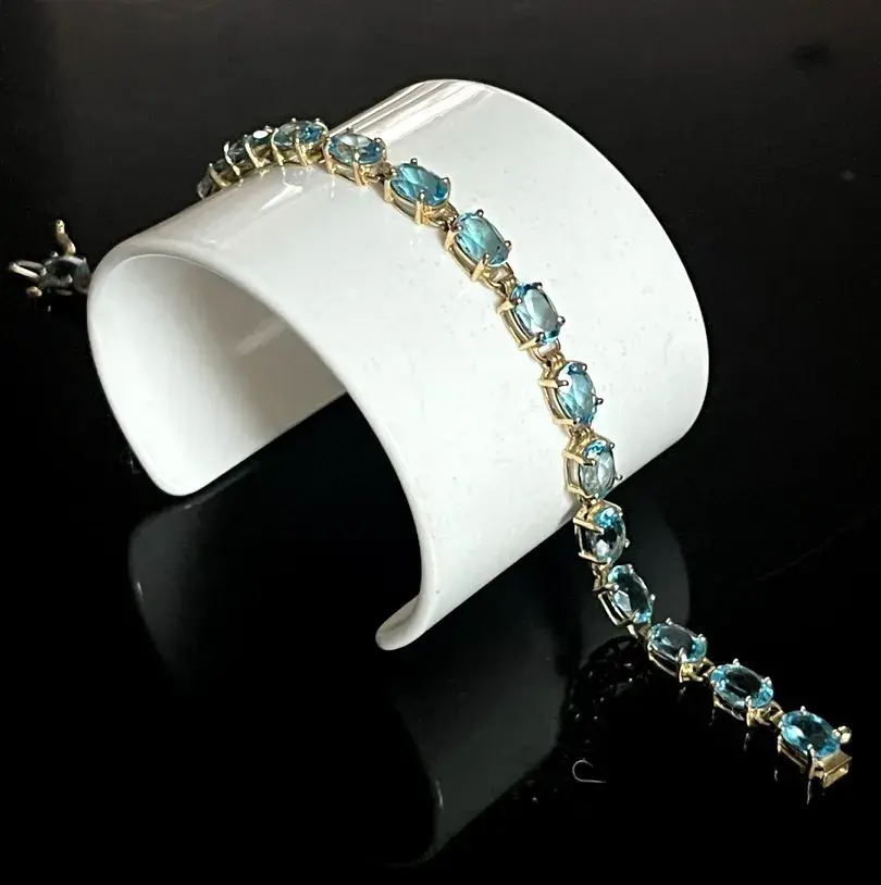 10K Yellow Gold 20 Oval Blue Topaz Tennis Bracelet 