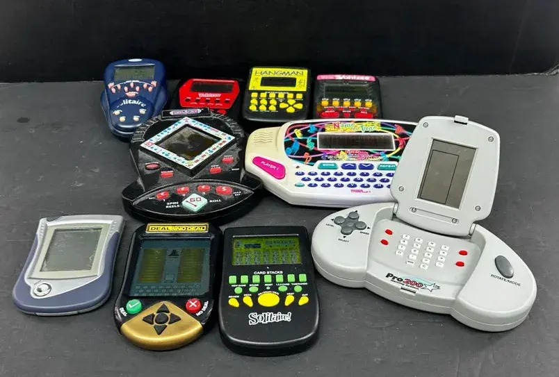 Electronic Games W/ Monopoly, Hangman, Solitaire, Others
