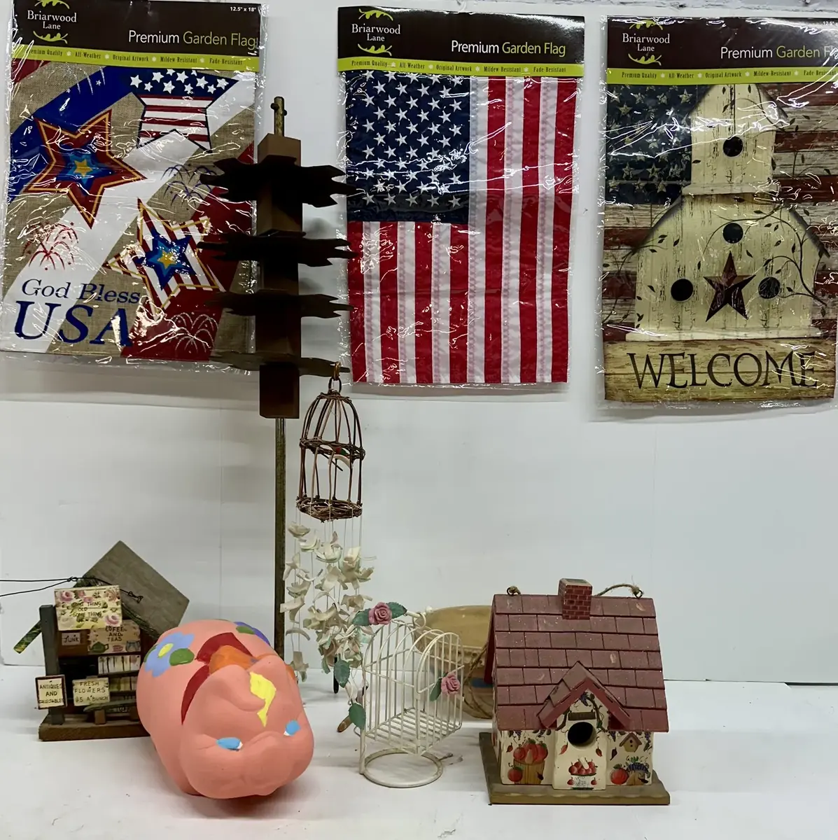 Yard & Garden Art w/ a Tiered Rusted Metal Spinner, Painted Birdhouses, Windchime, Flags & Other