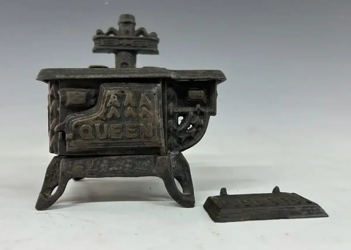 Vintage Queen Cast Iron Toy Stove