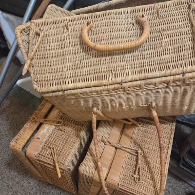 Sale Photo Thumbnail #61: Vintage woven wicker picnic baskets with handles and toggle closures, showing some wear from age.
