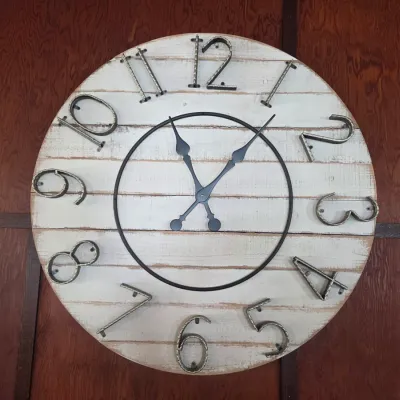Sale Photo Thumbnail #87: Large rustic wall clock featuring a whitewashed wood plank face with metal numbers and hands.