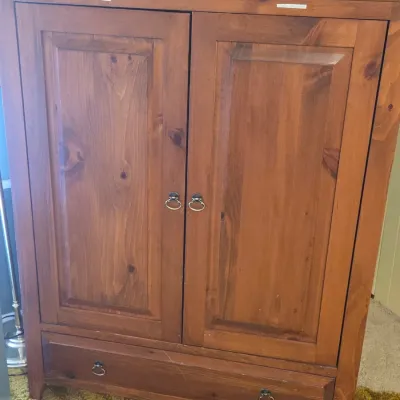 Sale Photo Thumbnail #41: Rustic pine armoire featuring two raised-panel doors with ring pulls and a single wide drawer at the base.