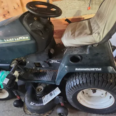 Sale Photo Thumbnail #102: Craftsman riding lawn mower featuring a Kohler 22HP V-Twin engine, automatic transmission, and a 46-inch EZ3 mulching deck.
