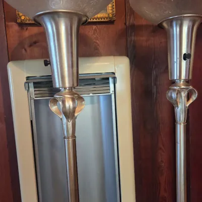 Sale Photo Thumbnail #71: Pair of vintage Art Deco style torchiere floor lamps with frosted glass shades and silver-toned metal bases.